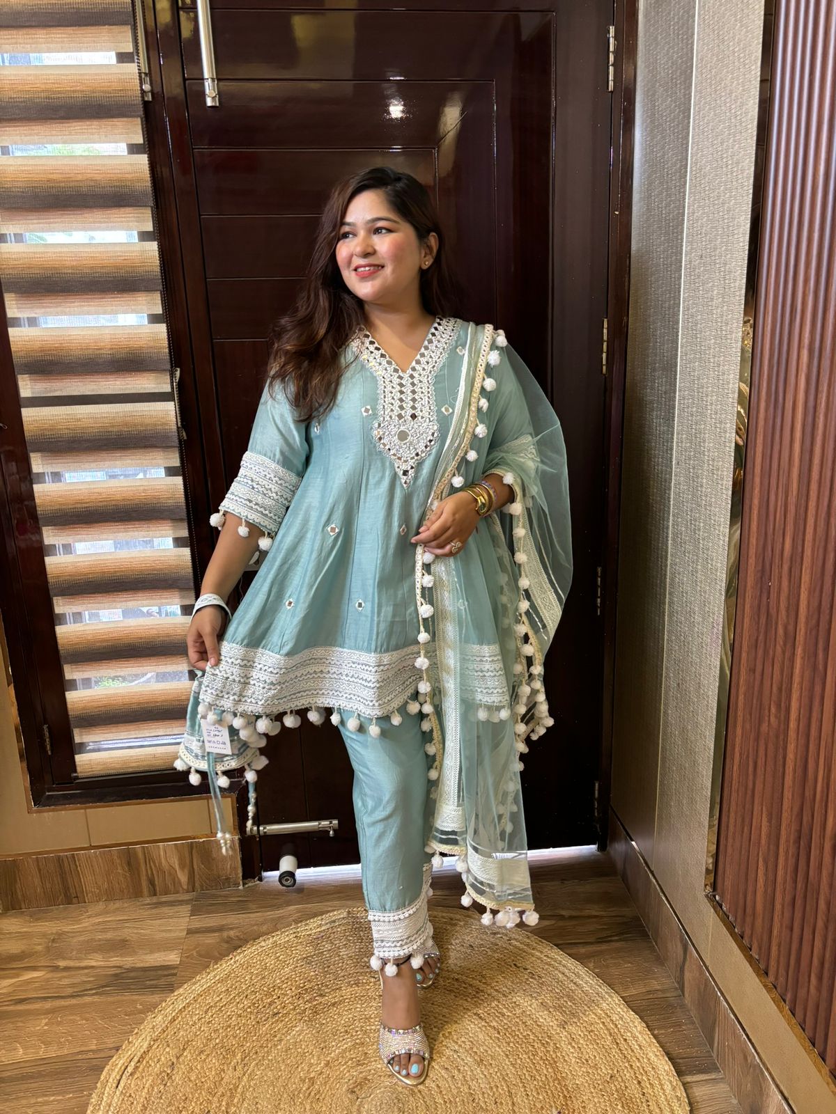 Pompom designer suits with potli