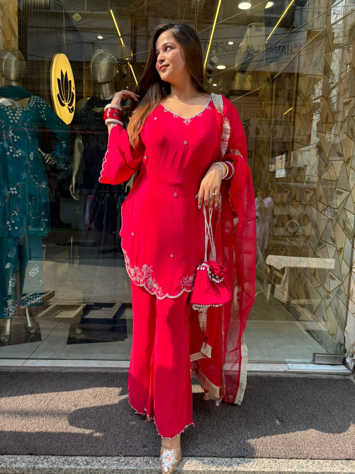 Red Tangy Suit with Potli
