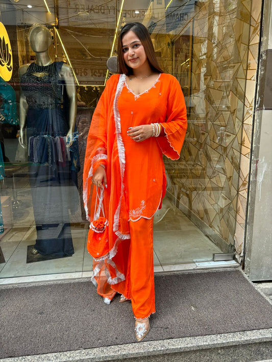 Orange Tangy Suit with Potli