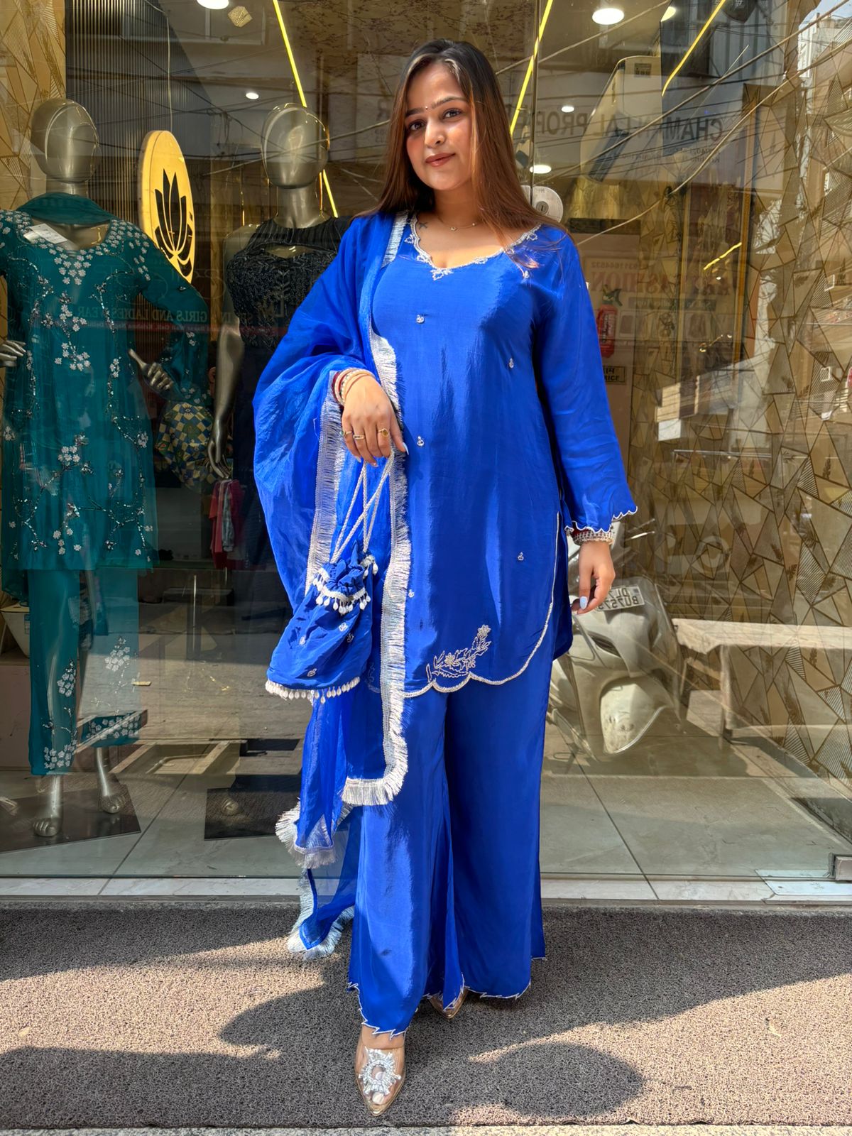 Blue Tangy Suit with Potli