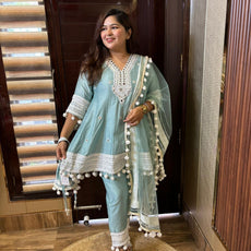 Pompom designer suits with potli