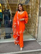 Orange Tangy Suit with Potli